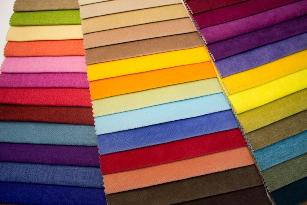 Fanned fabric swatch samples in many colors