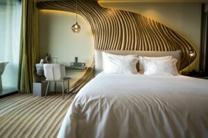 Hotel guest room with crisp white bedding