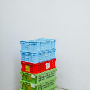 Stack of colorful plastic storage crates
